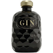 Black gin bottle with gold cap on a white background