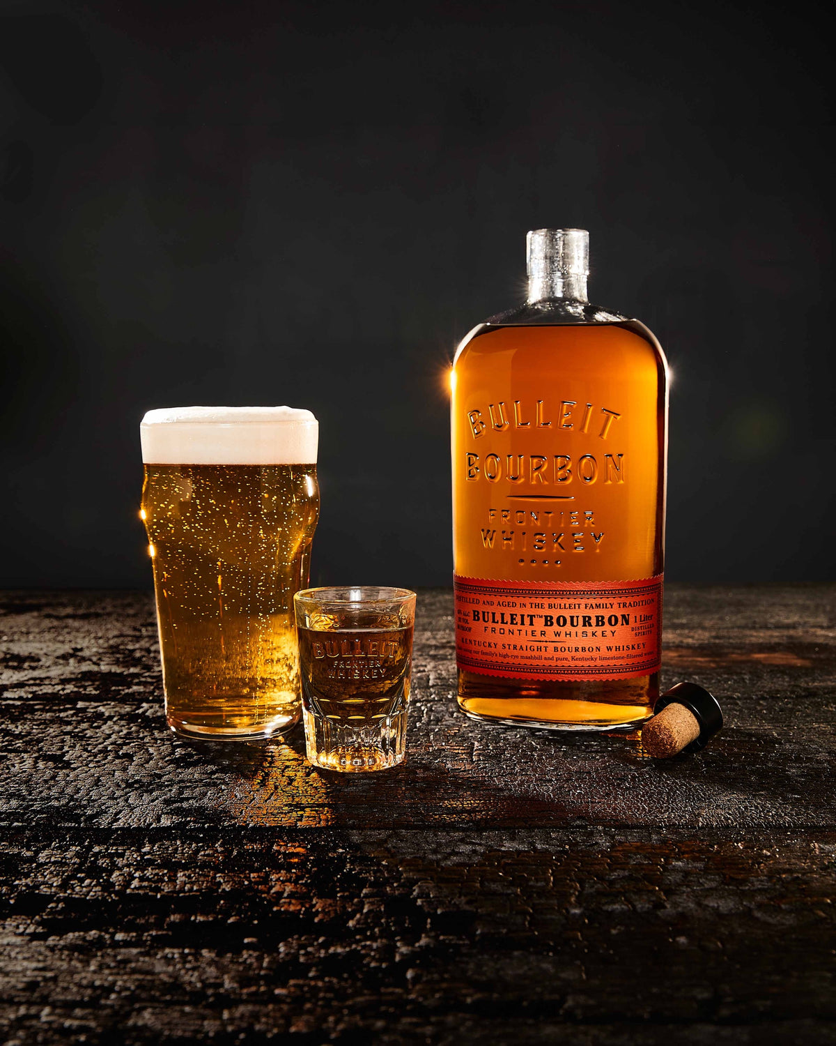 Bulleit Bourbon boilermaker with beer and a shot